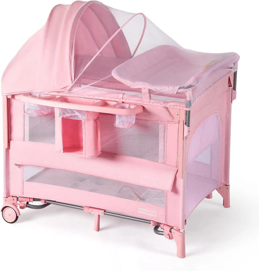 9-in-1 Convertible Baby Bassinet with Changing Table, Music Center, Mosquito Net & Storage - Pink